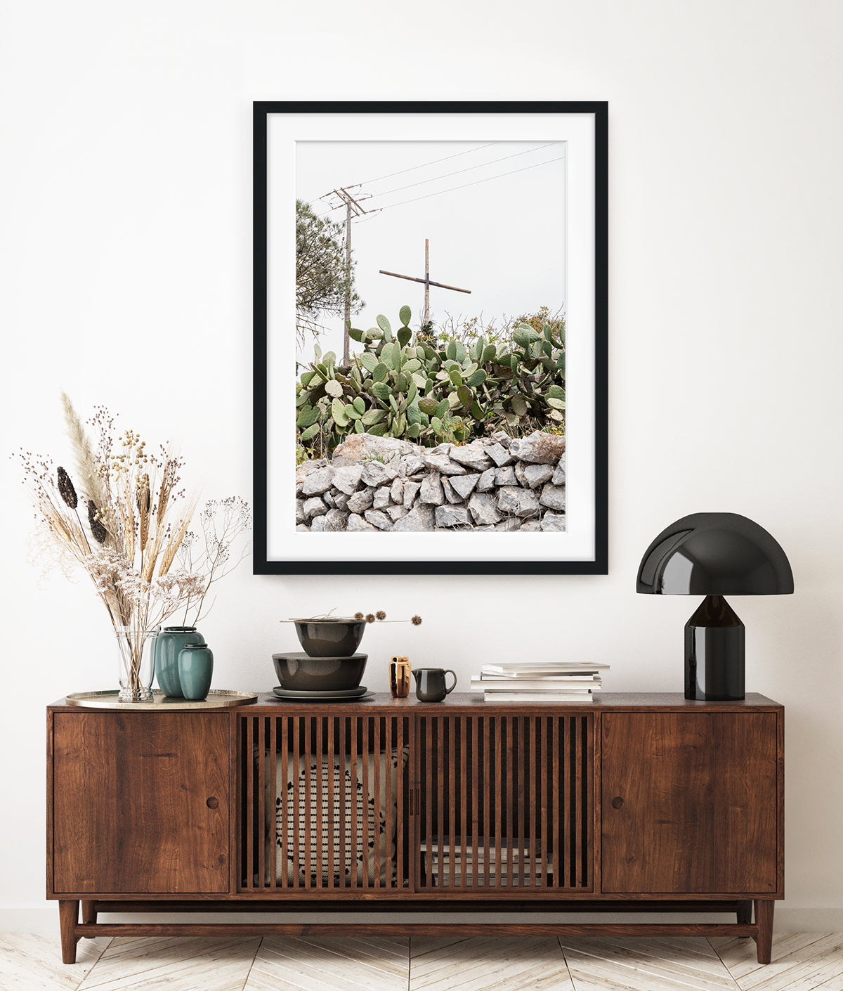 modern decor featuring minimal cross and cactus print taken in santorini greece