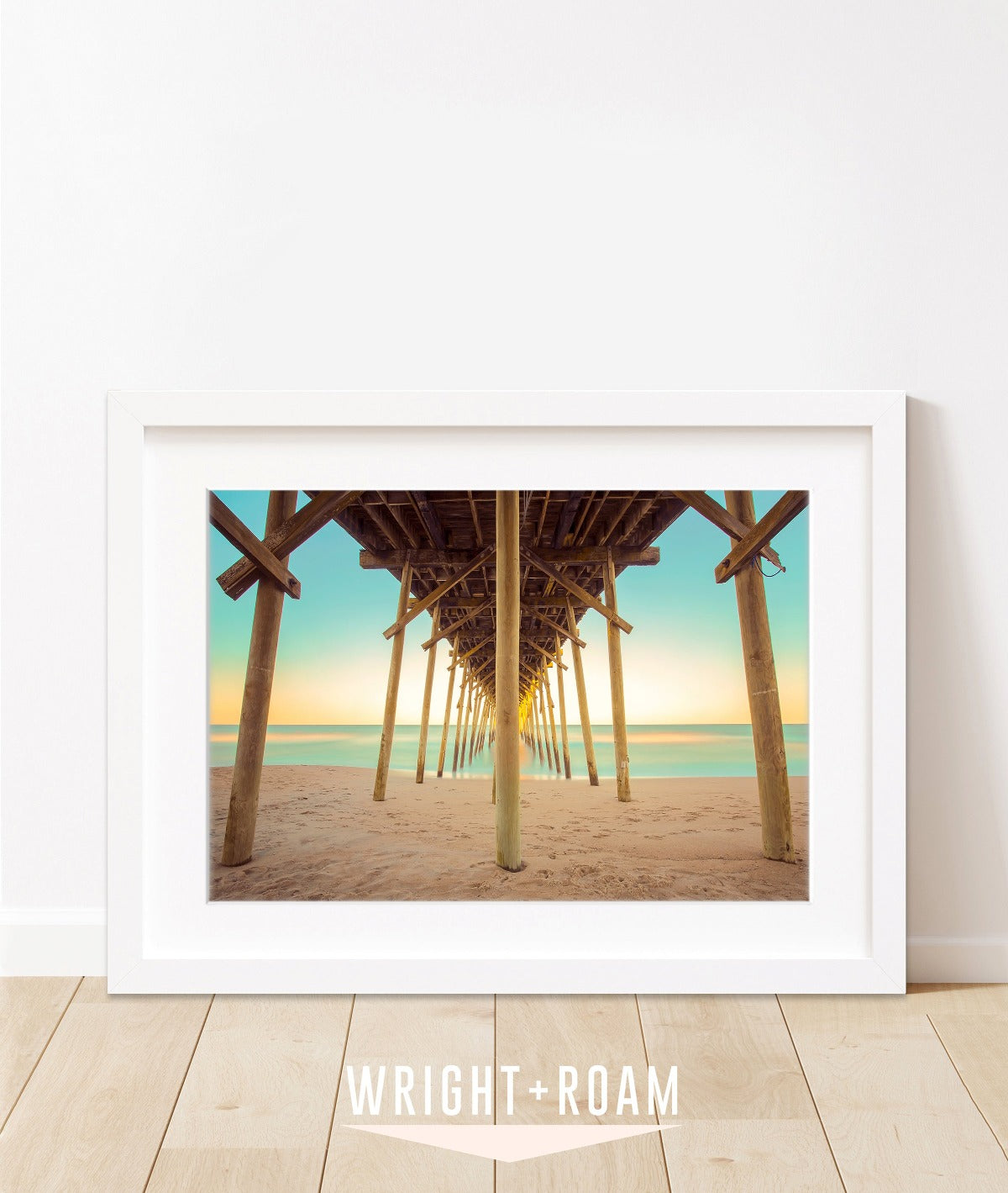 colorful pier blue and yellow sunset Carolina beach photograph by Wright and Roam