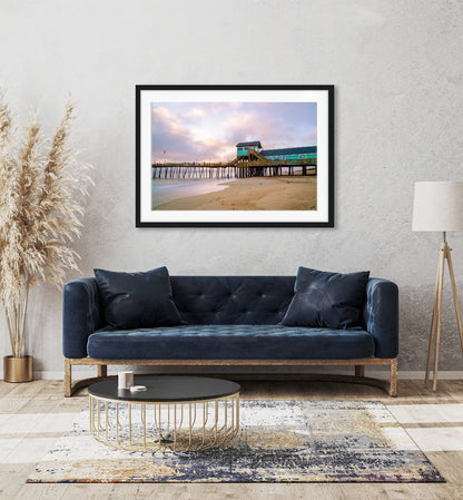 modern living room decor featuring framed beach photograph by Wright and Roam