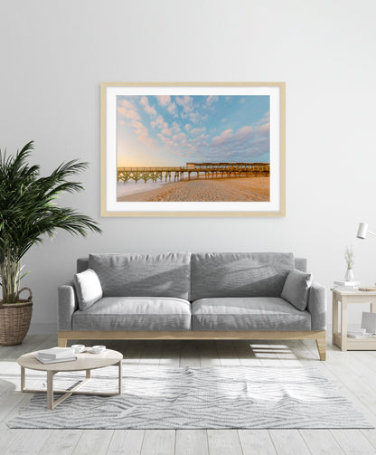 modern coastal living room, large framed beach photograph